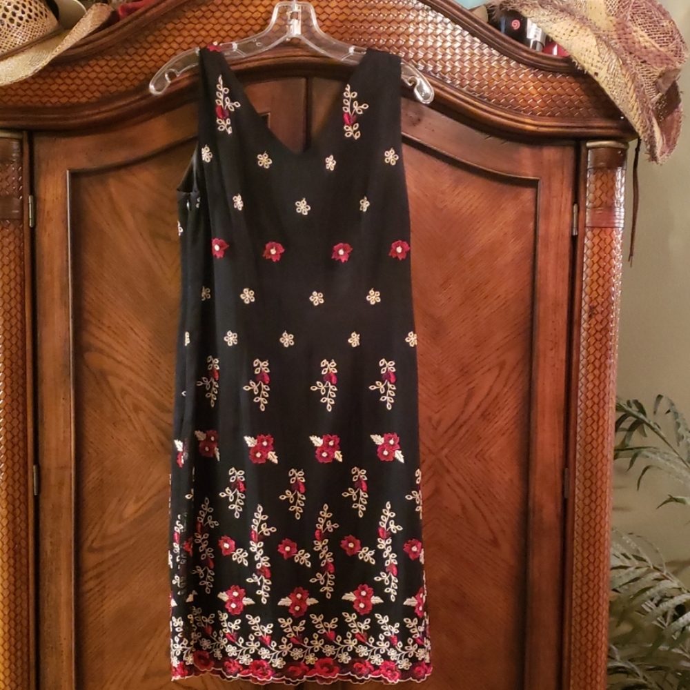 Black dress with embroidered design throughout